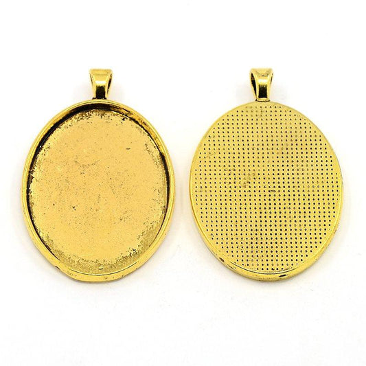 1.5 Inch Alloy Pendant Plain Edge Bezel Cups Oval Antique Golden Cabochon Settings - Golden / Oval / 5 Pcs [ Rs 32 / Piece ]