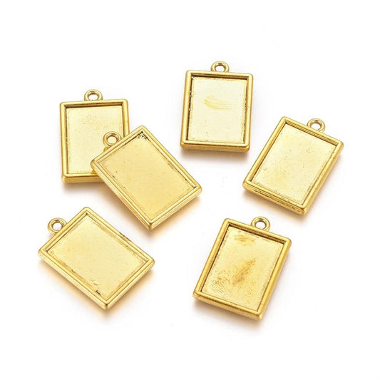 1.25 Inch Tibetan Pendant Rectangle Antique Golden Cabochon Settings - Golden / Rectangle / 10 Pcs [ Rs 17.5 / Piece ]