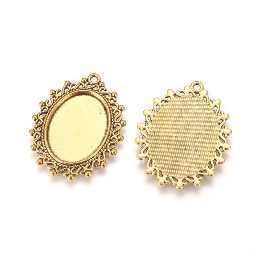 1.5 Inch Zinc Alloy Pendant Oval  Antique Golden Cabochon & Rhinestone Settings - Golden / Oval / 10 Pcs [ Rs 20.5 / Piece ]