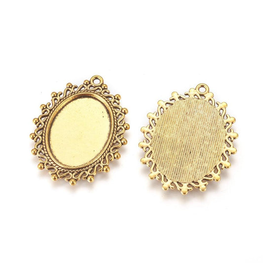 1.5 Inch Zinc Alloy Pendant Oval  Antique Golden Cabochon & Rhinestone Settings - Golden / Oval / 10 Pcs [ Rs 20.5 / Piece ]