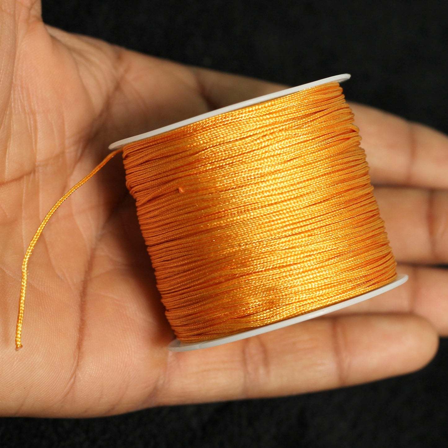 50 Mtr 0.5mm Colored Satin Thread Spool - Golden