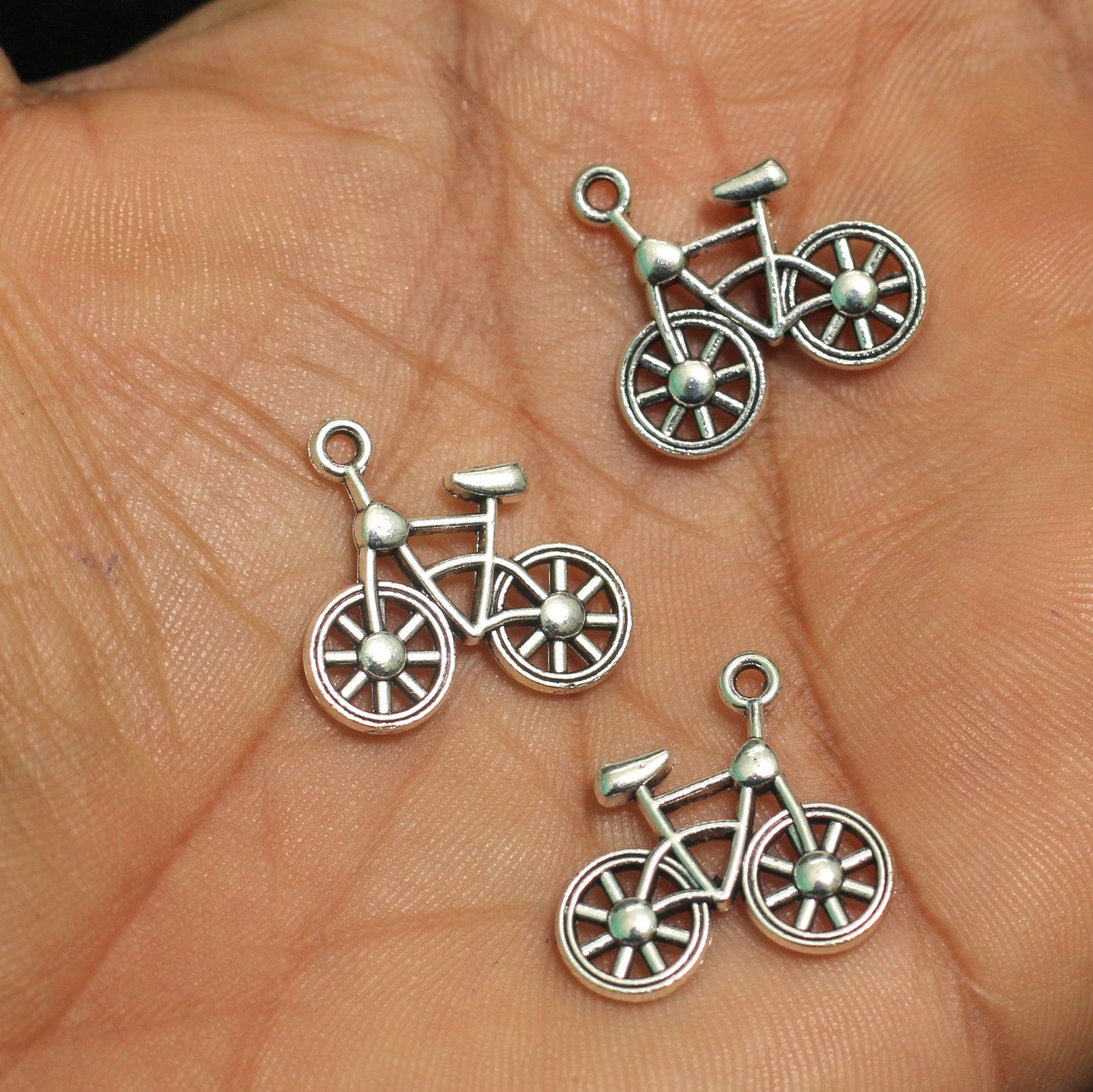 18mm German Silver Cycle Charms - Silver / German Silver / 10 Pcs [ Rs 9.5 / Piece ]