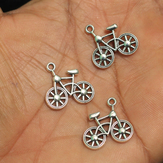 18mm German Silver Cycle Charms - Silver / German Silver / 10 Pcs [ Rs 9.5 / Piece ]
