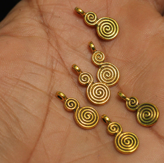 German Silver Charms Golden 17X7mm - Golden / German Silver / 25 Pcs [ Rs 4.4 / Piece ]