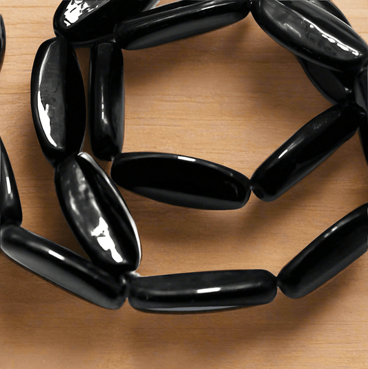 1 string of Oblong Glass Oval Beads 25x10mm - Black / Glass / Oval