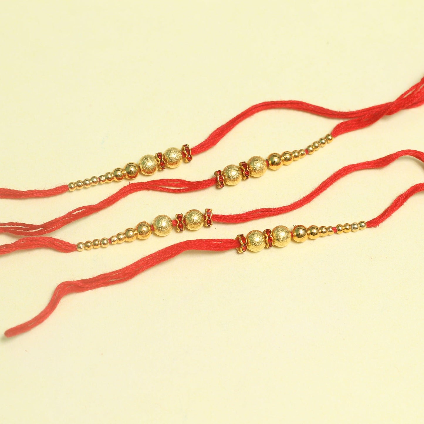 24 Pcs, Golden Beaded Rakhi Thread - 1 Packet